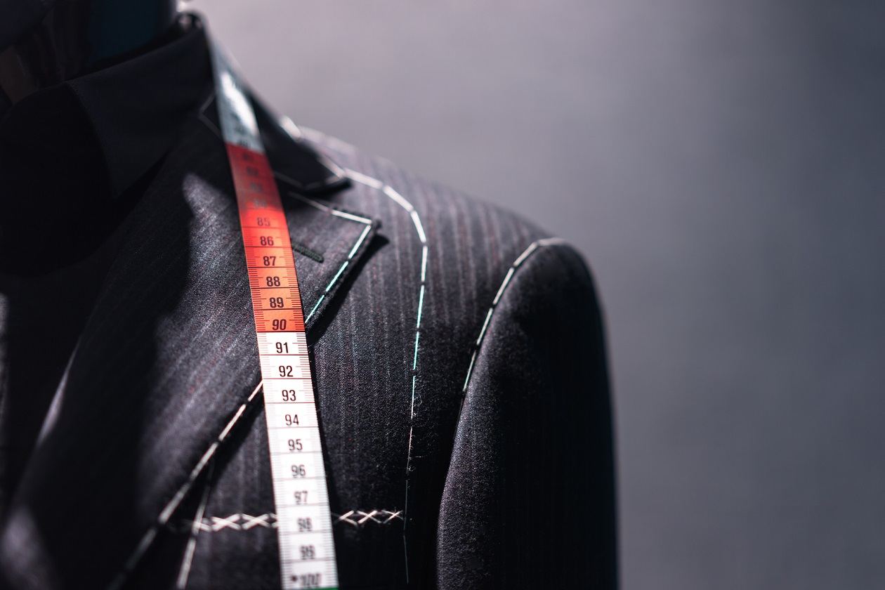 Tailor fitting a garment at AlterCleaners in San Francisco
